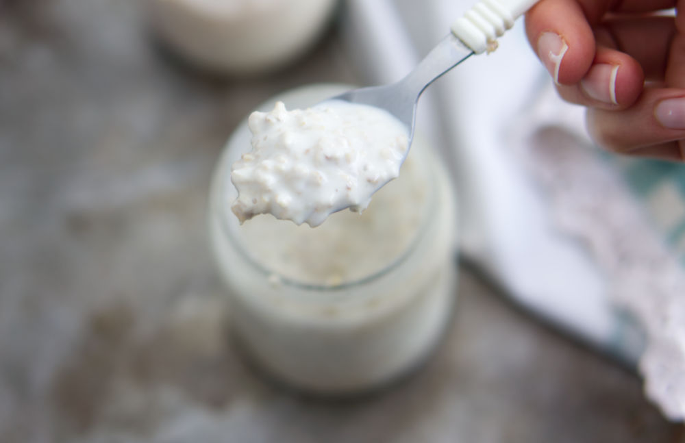 spoon with overnight oats with yogurt
